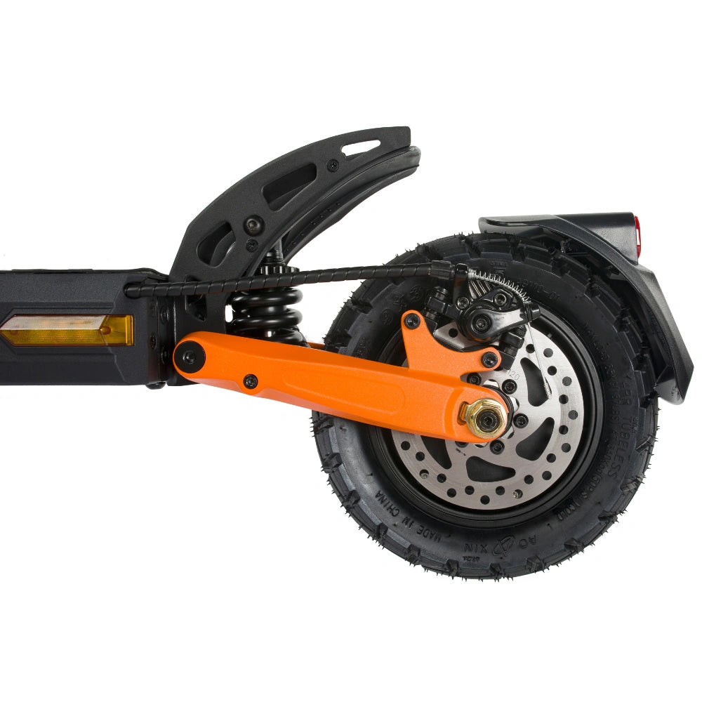 Horizontal close-up of KuKirin G2 Pro rear wheel structure, rear spring shock absorber, dual disc brake, vacuum tire, rear tail light and side turn signal lamp with orange aluminum suspension arm